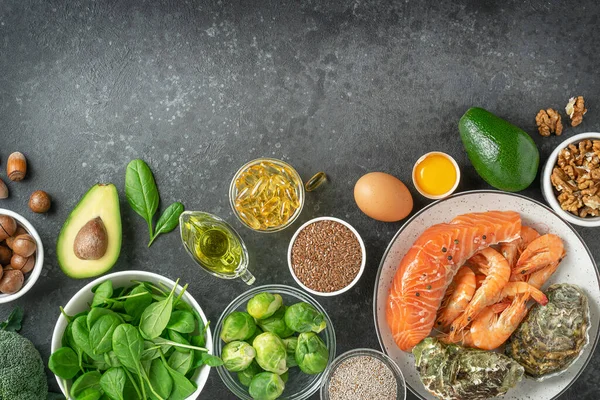 Omega 3 foods composition on dark concrete background. Copy space, directly above — Stock Photo, Image