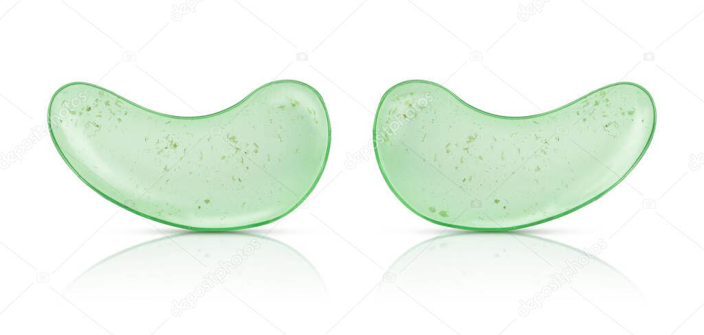 Green eye patches with aloe vera and tea tree leaves isolated on white background 