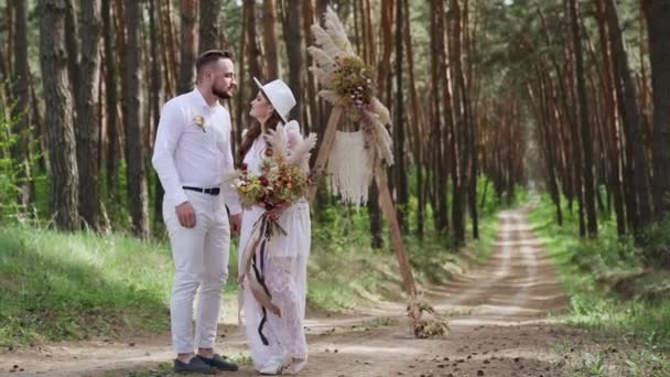 Young Couple Walking Holding Hands Hugging Autumn Forest Wedding Ceremony — Vídeo de Stock