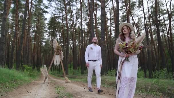 Wide Shot Groom Approaches Bride Forest Handsome Young Groom Walking — Video Stock