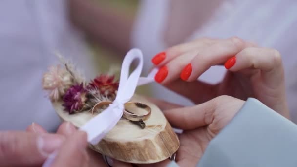 Groom Takes Engagement Ring Lying Flowers Wedding Ceremony Close Slow — 비디오