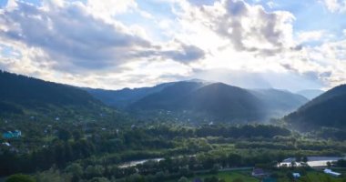 Timelapse of dramatic sunset clouds moving over the mountains, in Ukraine Carpathians. High quality 4k footage