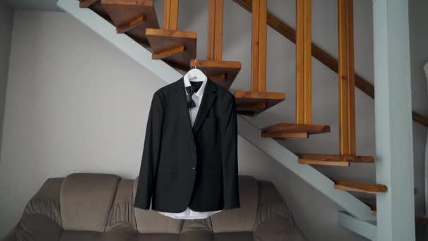 Mens Suit Hanger Hanging Wooden Stairs Moving Camera High Quality — Vídeo de Stock