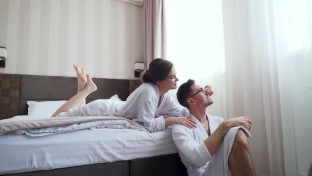 Young Happy Couple Smiling Having Fun Resting Lying Bed Loving – Stock-video