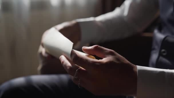 Man Reads Information Sheet Paper His Hand Becomes Happy Smiling — Stok video