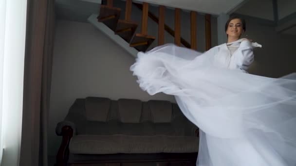 Bride White Dress Poses Waving Her Dress Gorgeous Modern Girl — Stockvideo
