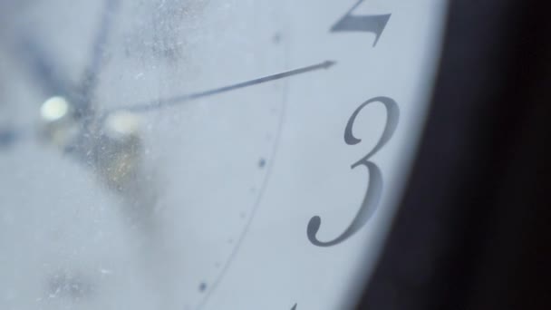 Extreme Closeup Metallic Second Arrow Passing White Clock Face Lengthwise — Stock Video