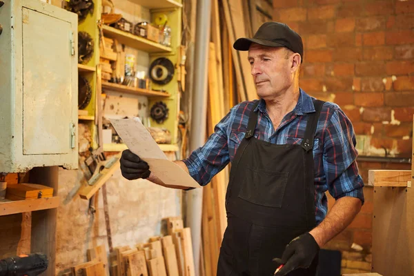 Portrait Senior Carpenter Looking Blueprints Plans Make Piece Furniture Carpentry — Stock Photo, Image