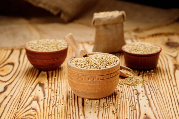 Buckwheat Groats Bowls Bags Wooden Background High Quality Photo — Stock Photo, Image