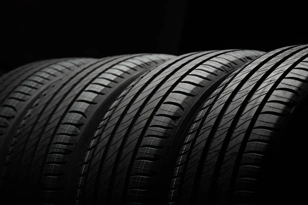 New Car Tires Group Road Wheels Dark Background Summer Tires — Stock Photo, Image