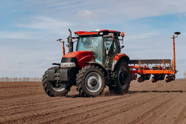 Spring Sowing Season Farmer Tractor Sows Corn Seeds His Field — Fotografia de Stock