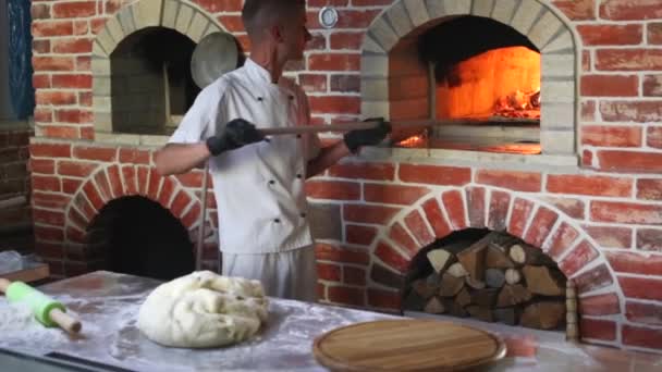 Chef Taking Hot Margarita Pizza Out Stone Oven Peel Putting — Stockvideo