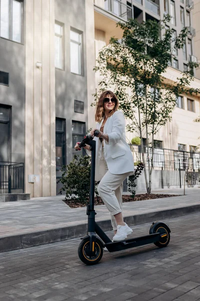 Beautiful Young Woman Sunglasses White Suit Standing Her Electric Scooter —  Fotos de Stock