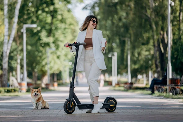 Beautiful Young Woman White Suit Sunglasses Standing Her Electric Scooter — 图库照片