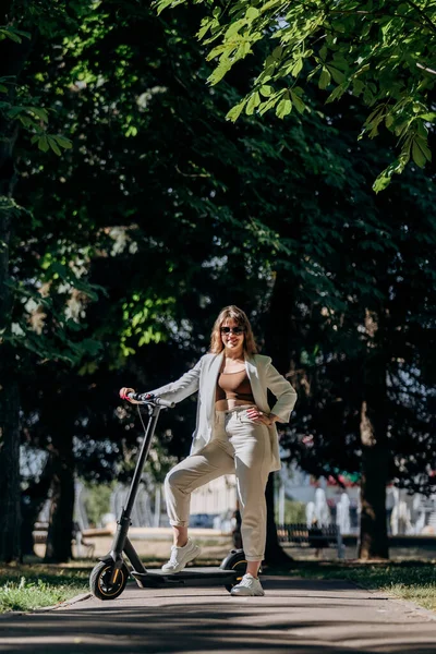 Beautiful Young Woman Sunglasses White Suit Standing Her Electric Scooter —  Fotos de Stock
