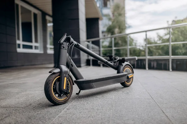 Folded Electric Scooter Concrete Surface Urban Street Modern Building — 스톡 사진