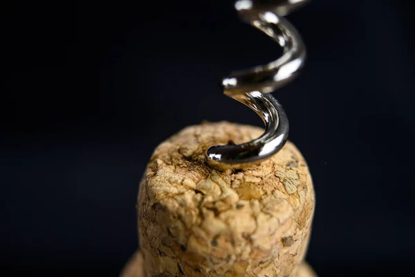 Champagne cork and bottle opener close up shot — Stockfoto