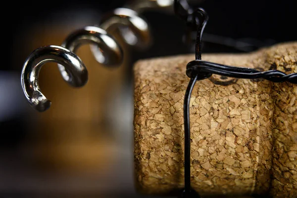 Champagne cork and bottle opener close up shot — Stockfoto