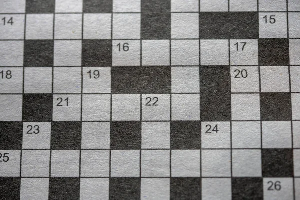 Puzzle de crucigramas en el periódico de escala de grises — Foto de Stock
