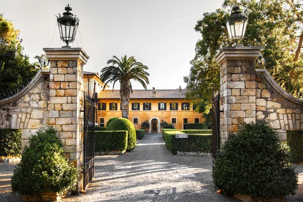 View through the gate to the Italian villa.