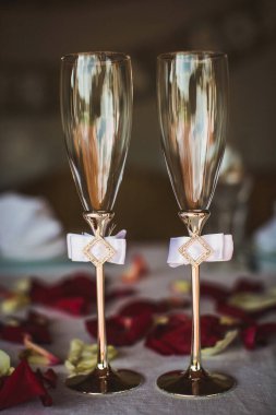 Two wedding champagne glasses on the table.