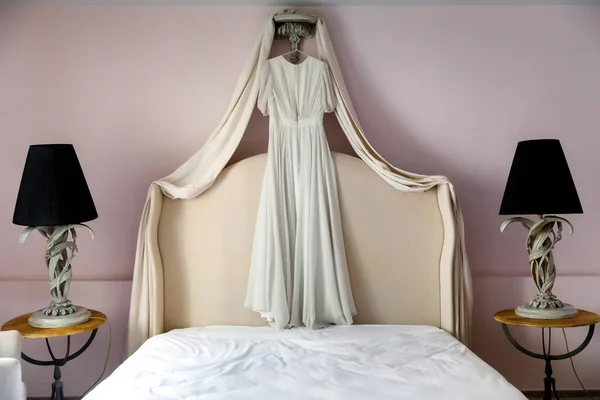Wedding Dress Hanging Bed Hotel Room — Stock Photo, Image