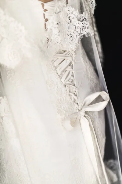 Beige wedding dress with lace. Details closeup.