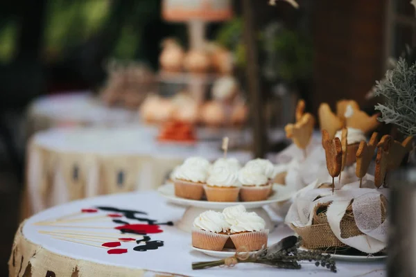 Rows of desserts on the wedding table.