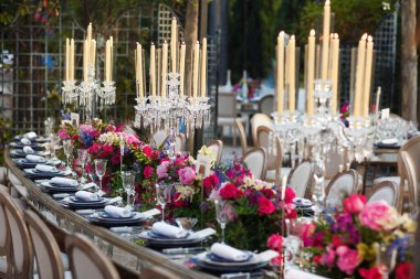 Decorated served table for wedding party or other event.
