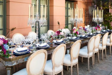 Decorated served table for wedding party or other event.