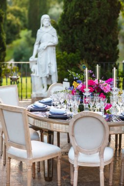 Decorated served table for wedding party or other event.