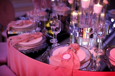 Decorated served table for wedding party or other event.