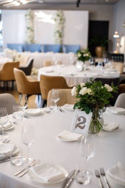 Decorated served table for wedding party or other event.