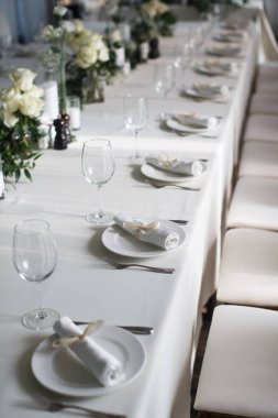 Decorated served table for wedding party or other event.