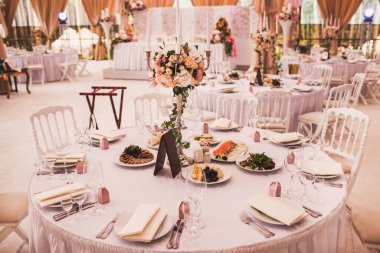 Decorated served table for wedding party or other event.