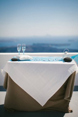 Two wedding champagne glasses on the table.
