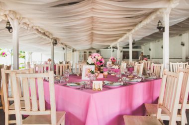 Decorated served table for wedding party or other event.