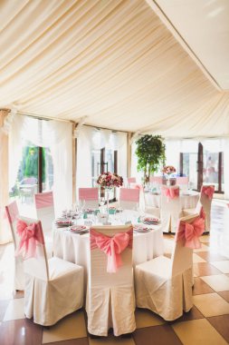 Decorated served table for wedding party or other event.