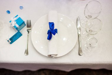 Decorated served table for wedding party or other event.