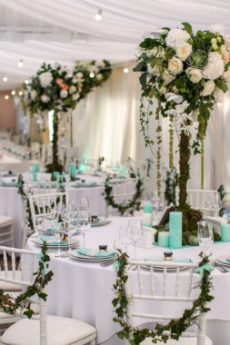 Decorated served table for wedding party or other event.