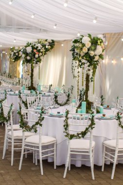 Decorated served table for wedding party or other event.