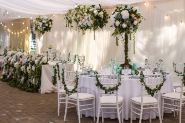 Decorated served table for wedding party or other event.