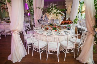 Decorated served table for wedding party or other event.