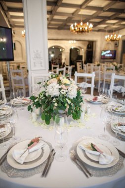 Decorated served table for wedding party or other event.