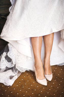 Bride in the morning during wedding preparations.