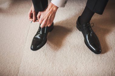 Groom in the morning during wedding preparations.