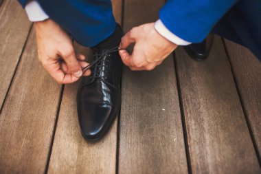 Groom in the morning during wedding preparations.