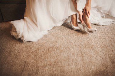 Bride in the morning during wedding preparations.