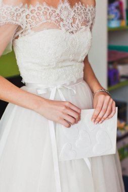 Bride in the morning during wedding preparations.