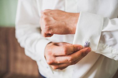 Groom in the morning during wedding preparations.